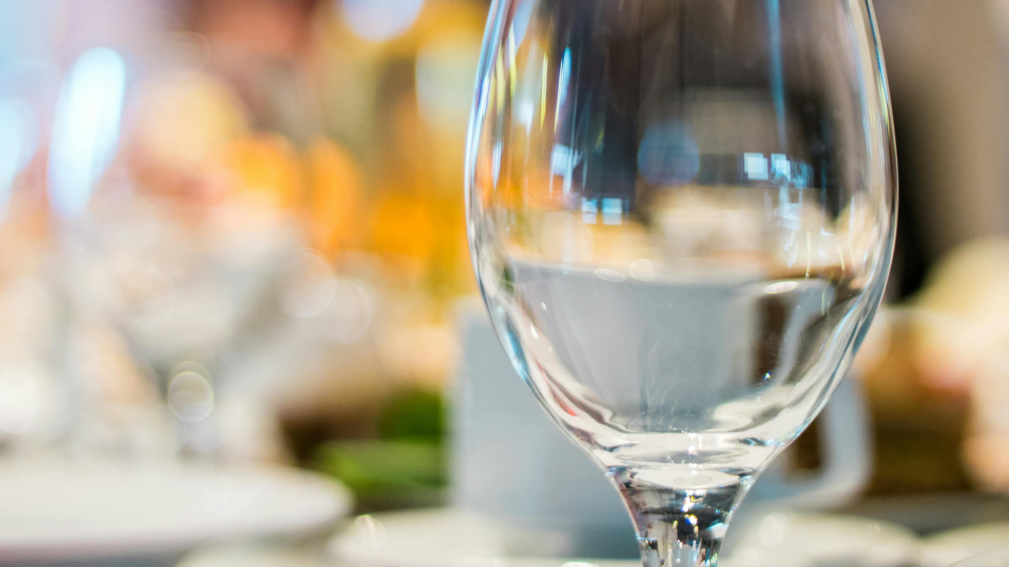 Close detail of mise en place, tools, and garnish work at the pass